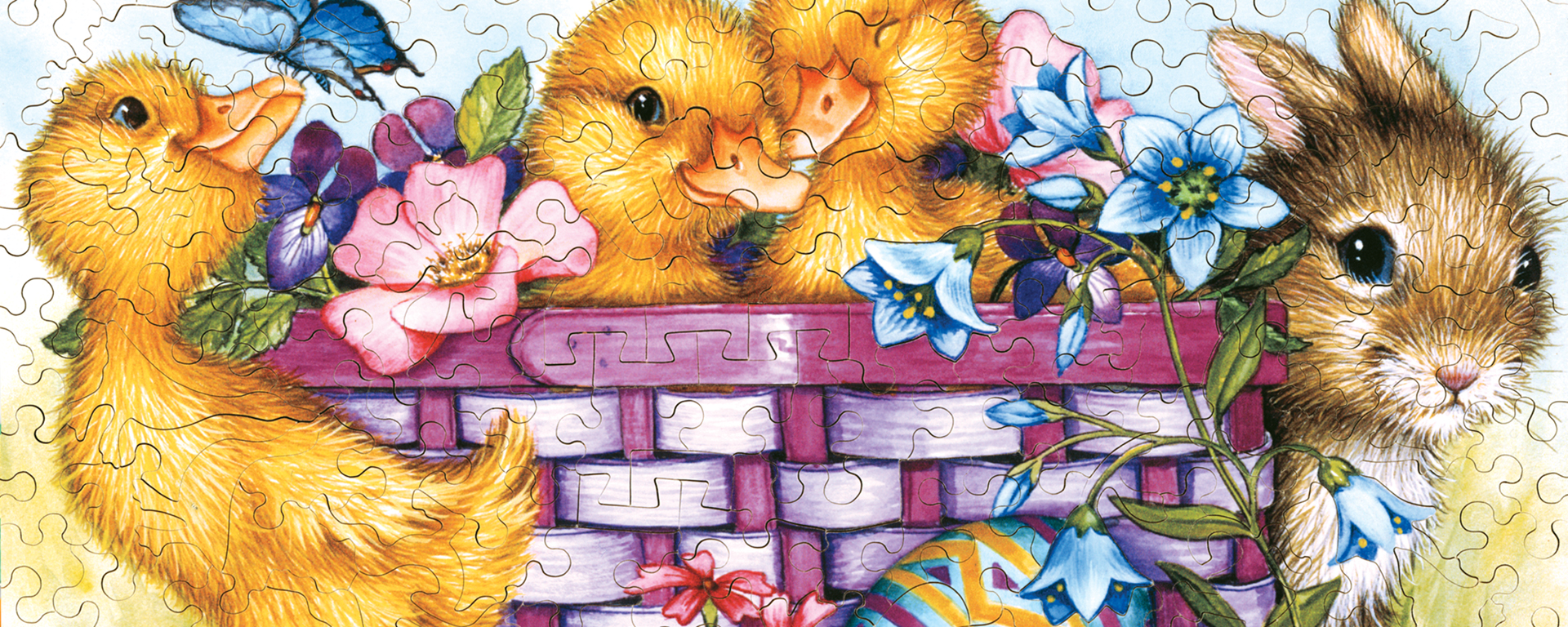 Wooden Easter jigsaw puzzle featuring a duckling and a bunny standing next to a pink basket full of flowers and ducklings.